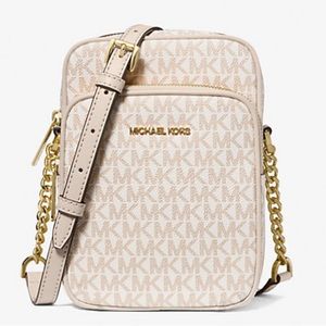 Jet Set Travel Medium Signature Logo Crossbody Bag
Color: OPTIC WHITE/ROSE GOLD